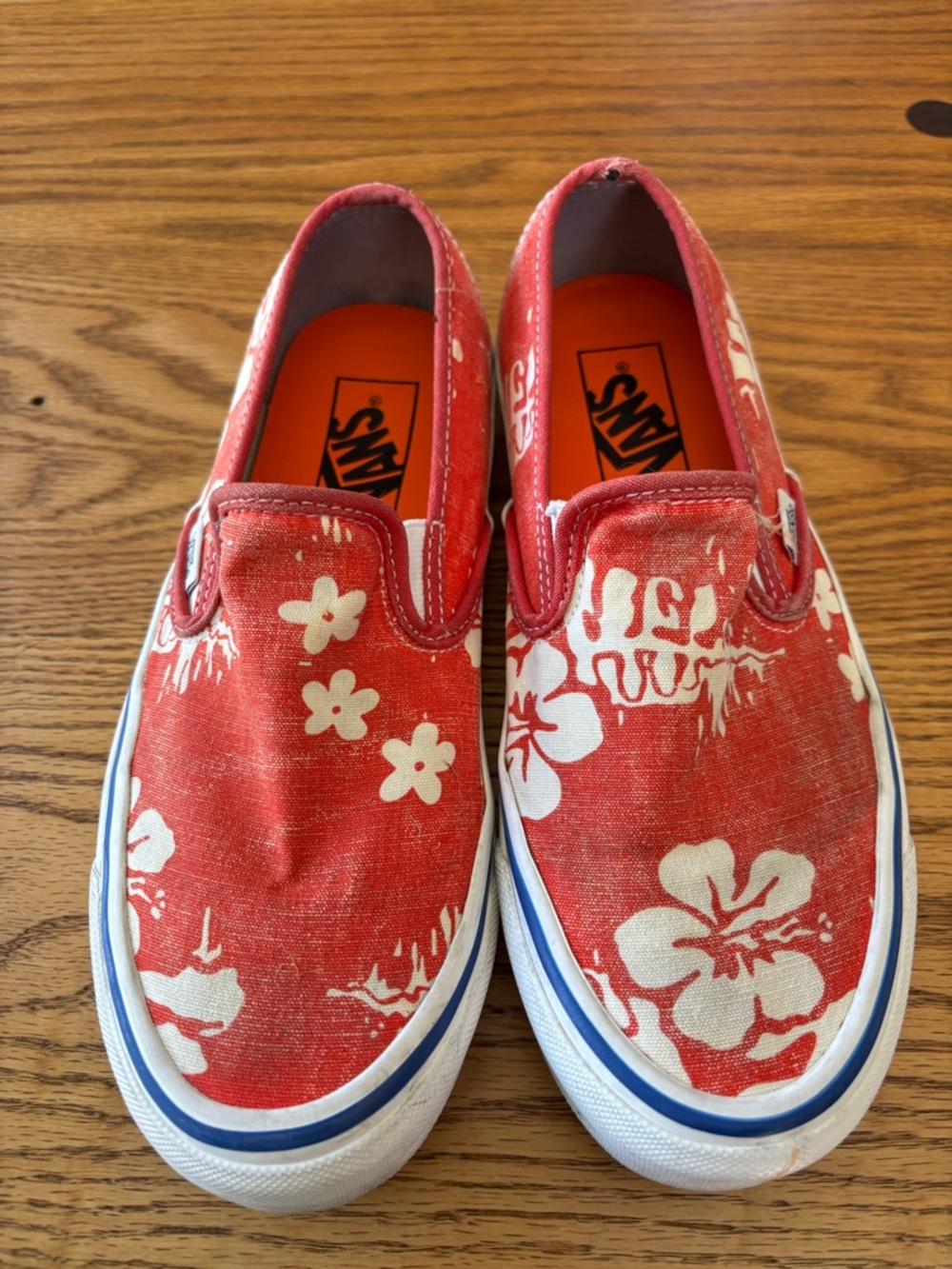 Vans Orange Canvas Slip-On Sneakers with White Floral Print